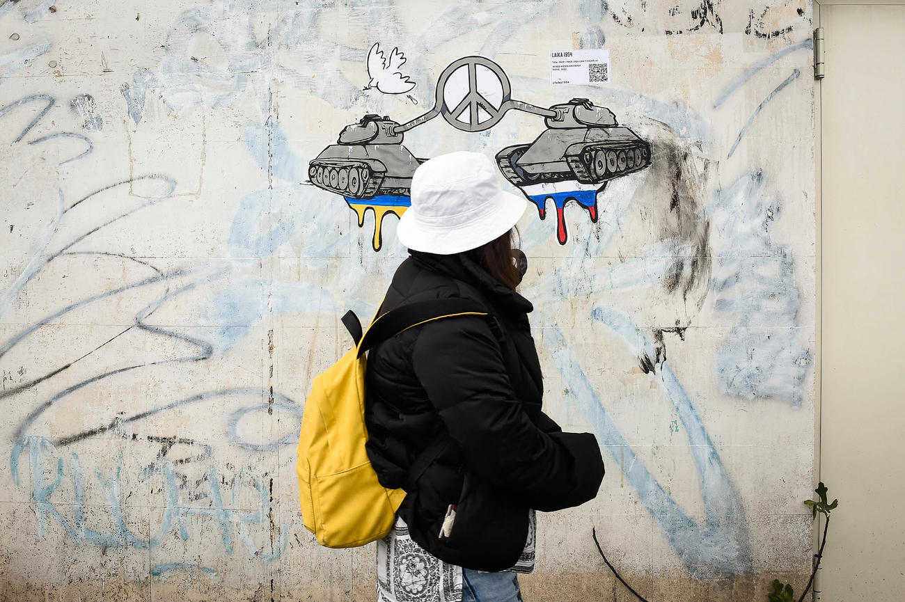 Peace – a mural by street artist Laika. The artist has created two twin posters, posted near the Russian and Ukrainian embassies in Rome.