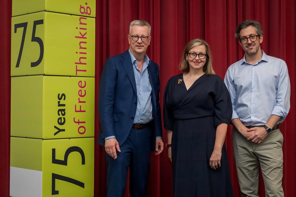 Professor Anita Traninger, Professor Conrado Hübner Mendes (right), and Professor Günter M. Ziegler, president of the university.