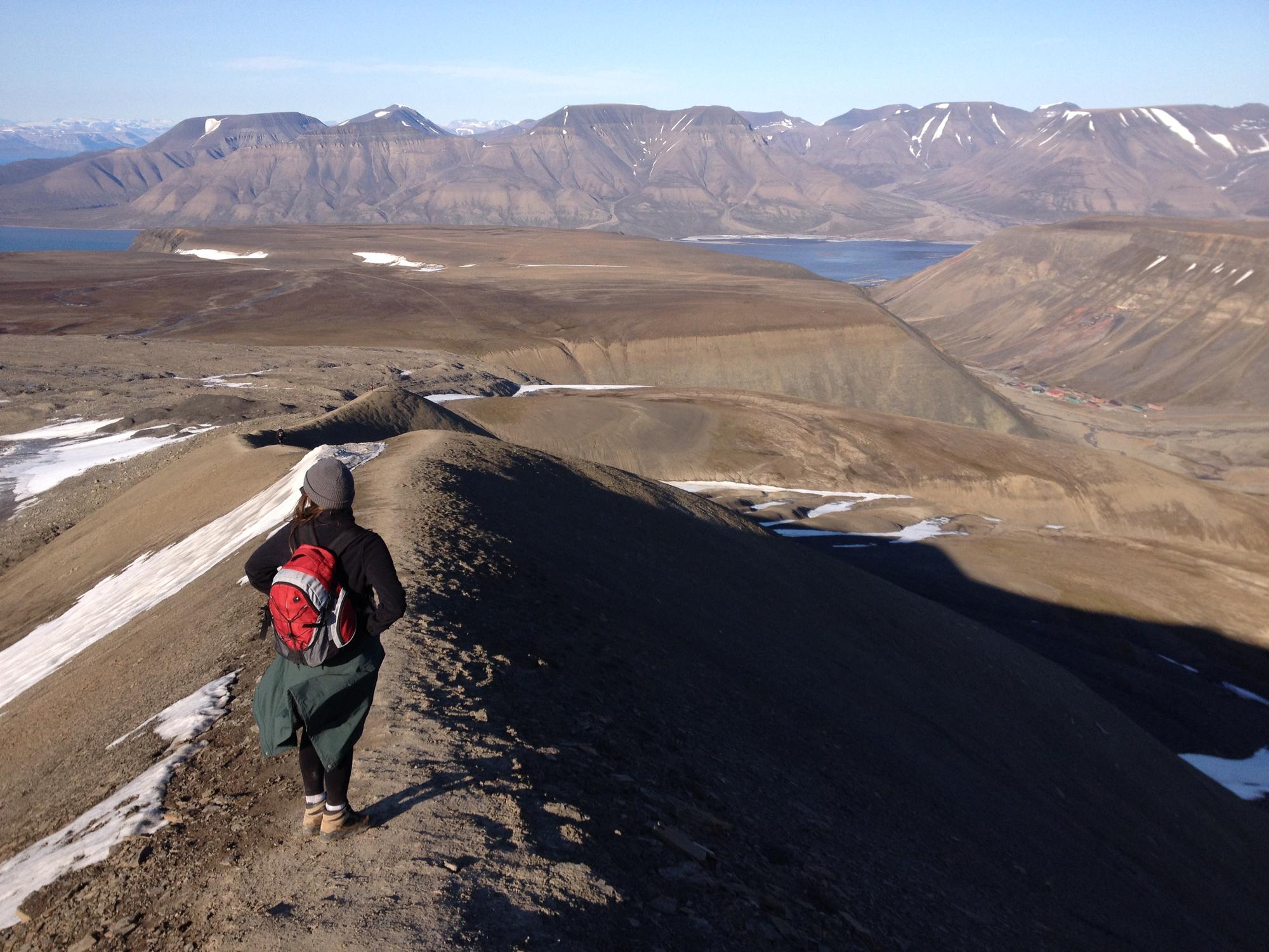 “Probably the most unreal thing to me is the natural landscape,” Janna says. In this photo, she is hiking on the highest mountain in the island group, Nordenskiöldfjellet.